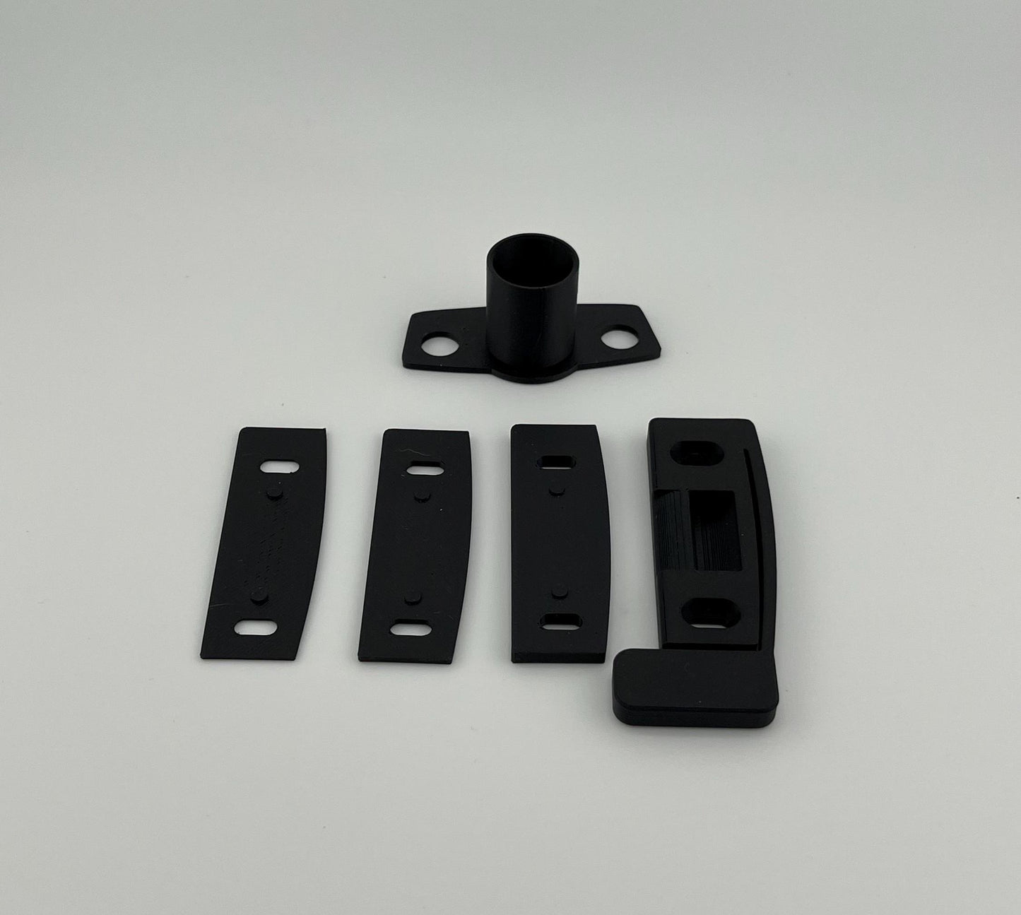 Strike Plate with rattle stopper, shims to adjust strike plate, and sleeve to fix latch position in the door