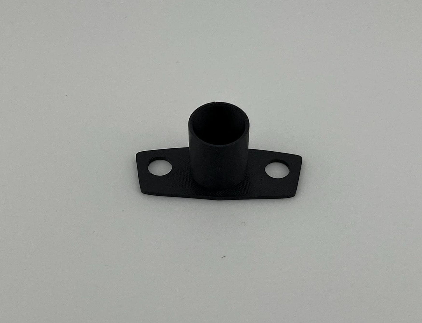 This sleeve fits on the outside of the door latch, and protects the pushbutton. It allows for unrestricted motion of the button and also prevents the door handle from shifting in the latch.