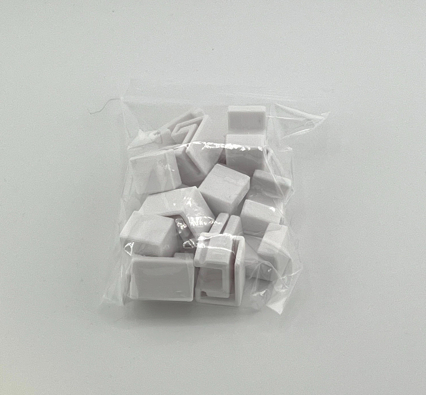 Protective Window Shade end covers (7 pairs), fits window shades on Escape Trailers.