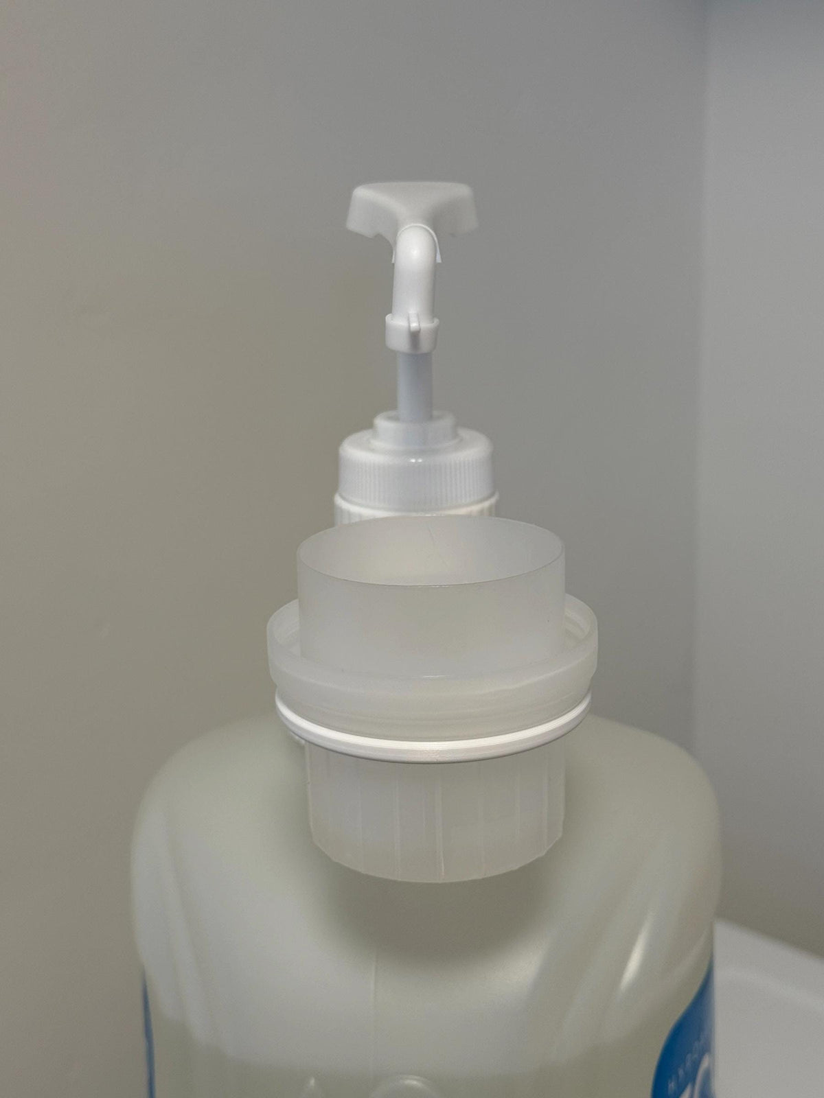 Hand pump dispenser for ECOS laundry detergent bottle. Fits giant 225 fl oz. size from Costco!